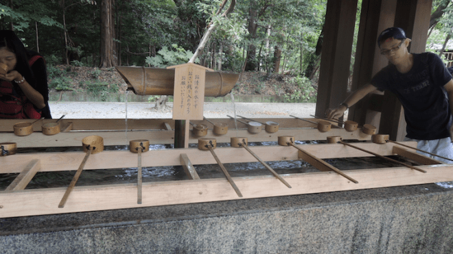 Cleansing before entering the shrine - wash both hands, then your mouth (optional) before washing the dipper handle