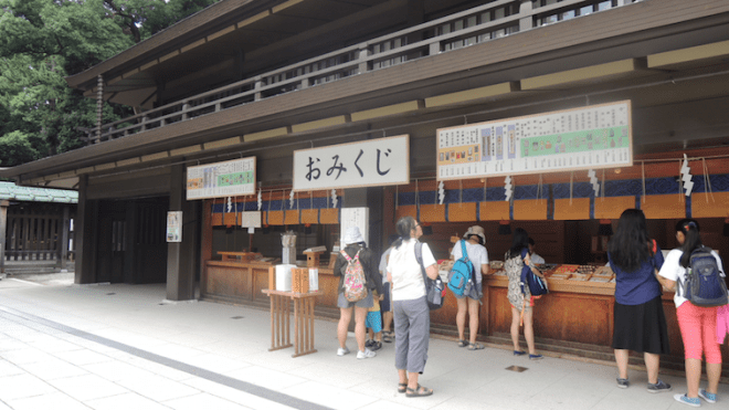 Omikuji - another practice I got acquainted with because of...something I was writing. There is a bunch of sticks held in a wooden container and you shake it so one falls off. The corresponding reading to your stick is supposed to predict your fortune - if you get a 'kichi' which means blessing (and there are variations of kichi ranging from great to small) you can keep it with you. On the other hand, if one gets a 'kyou' which means curse, they usually tie it on a provided rack, signifying 'leaving the curse behind'. But it's okay to bring it along with you too if you want. Sadly, I didn't get a fortune for myself because 1) I need to pay and 2) I don't think I want to know about my fortune even though omikuji is rarely taken too seriously anymore